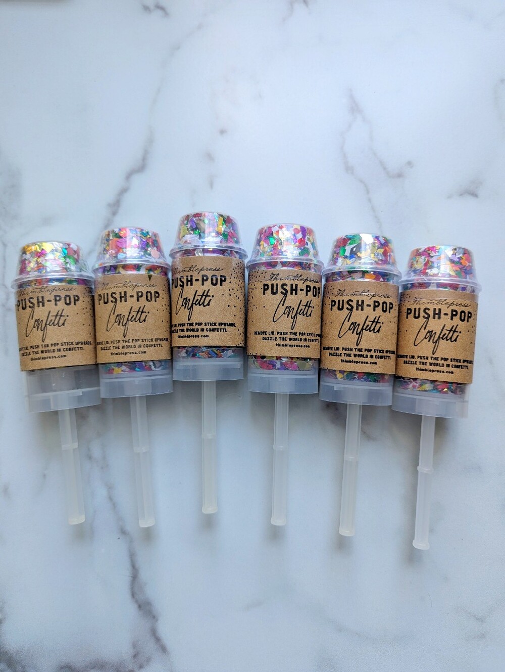 Confetti push pops from Thimblepress, party poppers